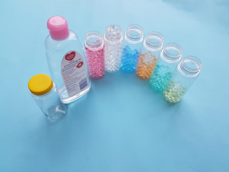 Making a rainbow sensory bottle